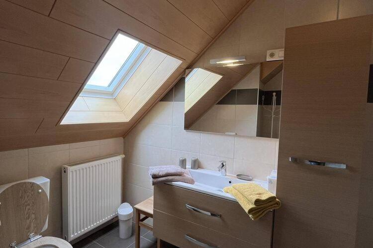 Holiday home Alluring In With Garden Waimes